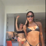 Carefree Moves: Friends Enjoying the Rhythm In Bikini